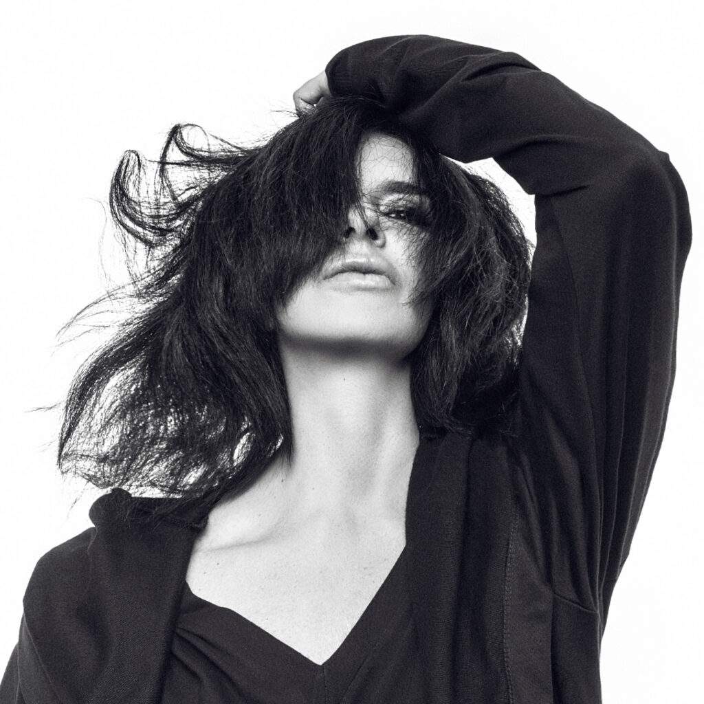 Nicole Moudaber posing in balck and white photo