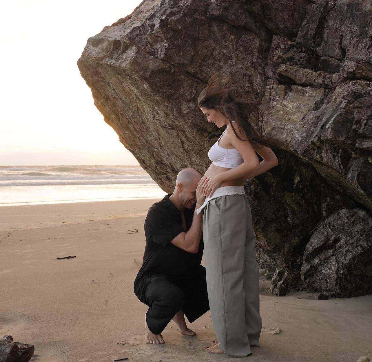 Fisher celebrates anniversary with his pregnant wife Chloe. 