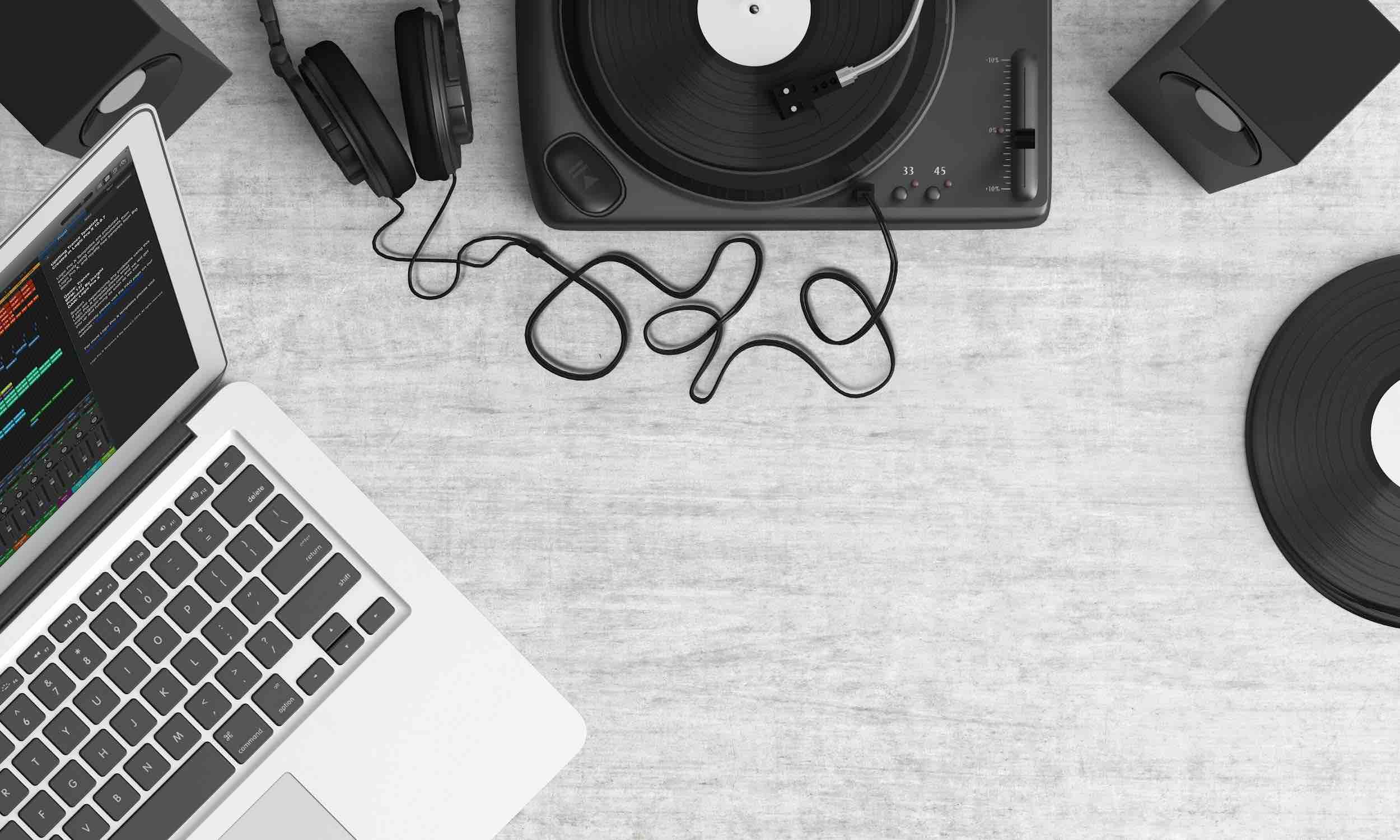 turntable and laptop on table