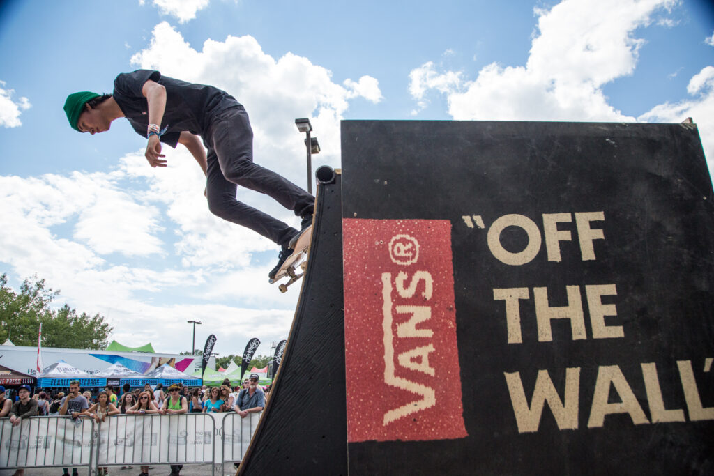 man skateboarding at warped tour