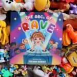 The ABC's of Rave book cover over pile of toys