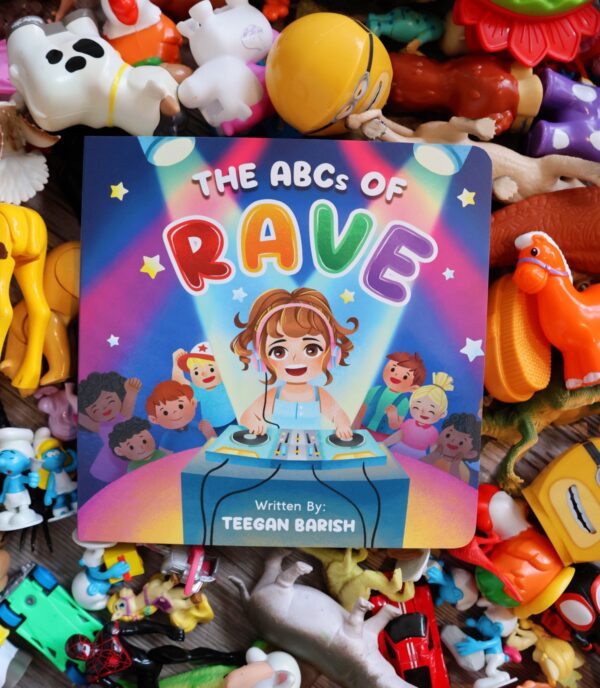 The ABC's of Rave book cover over pile of toys